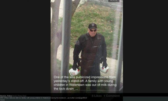Cop Photo Goes Viral: Boston Cop Delivers Milk in Lockdown