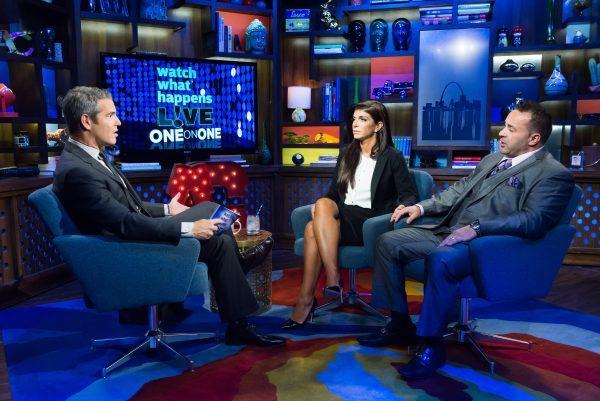 In this image released by Bravo shows host Andy Cohen, left, speaks with Teresa Giudice, and her husband Joe Giudice. (AP Photo/Bravo, Charles Sykes)