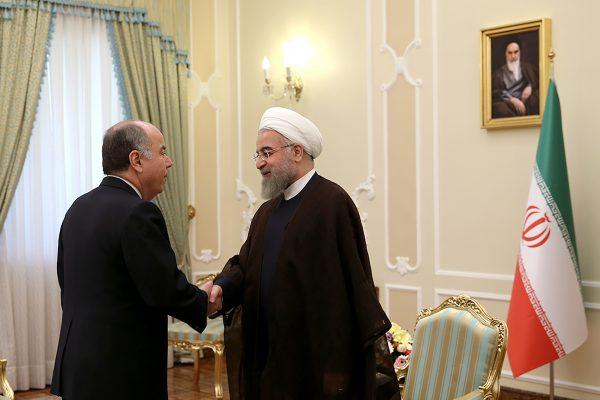 Former Iranian President Hassan Rouhani (R) greets Brazilian Foreign Minister Mauro Luiz Iecker Vieira in Tehran, Iran, on Sept. 13, 2015. (Iranian Presidency Office via AP)