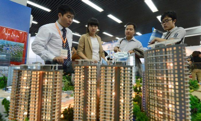 China’s Leading Real Estate Companies Cut Thousands of Jobs