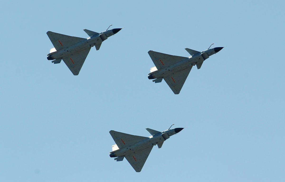 Chinese J-10 fighter jets fly on display over the Yangcun Air Force base of the People's Liberation Army Air Force in Tianjin on April 13, 2010. (Frederic J. Brown/AFP/Getty Images)