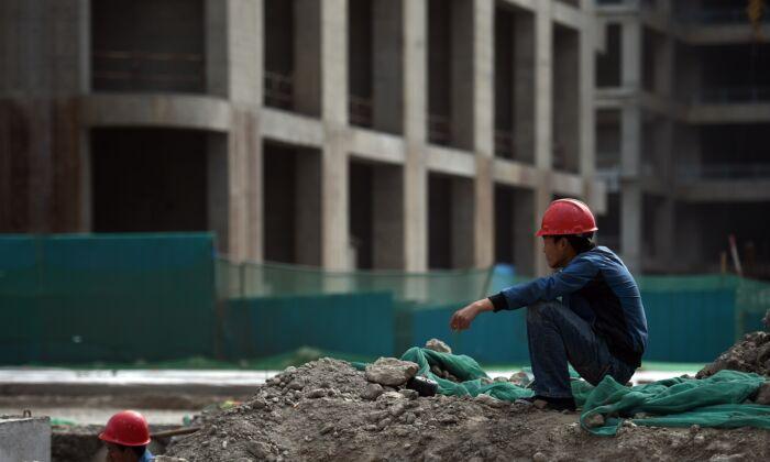 China’s Think-Tank Warns of Economic Slowdown Amid Property Sector Predicament