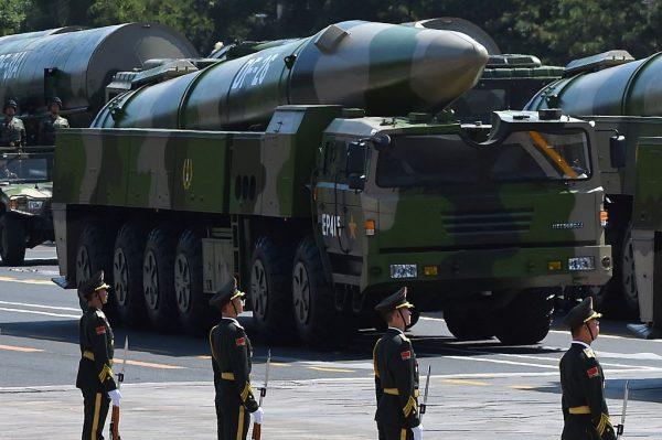 Military vehicles carrying DF-26 ballistic missiles participate in a military parade at Tiananmen Square in Beijing on September 3, 2015. (Greg Baker/AFP/Getty Images)
