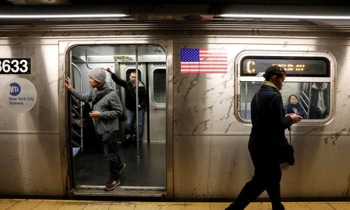 Woman Trapped Under NY Subway for 20 Minutes, Escapes With Minor Injuries