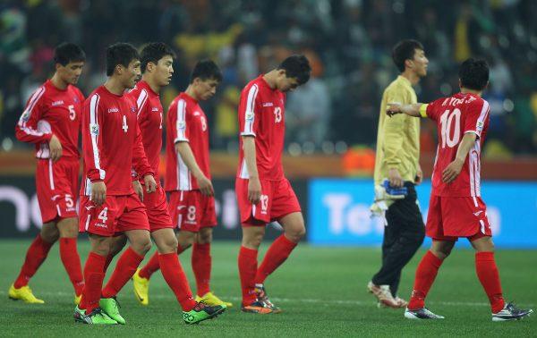 The North Korea team after defeat and elimination from the tournament during the 2010 FIFA World Cup South Africa Group G match between North Korea and Ivory Coast at the Mbombela Stadium in Nelspruit, South Africa, on June 25, 2010. (Michael Steele/Getty Images)