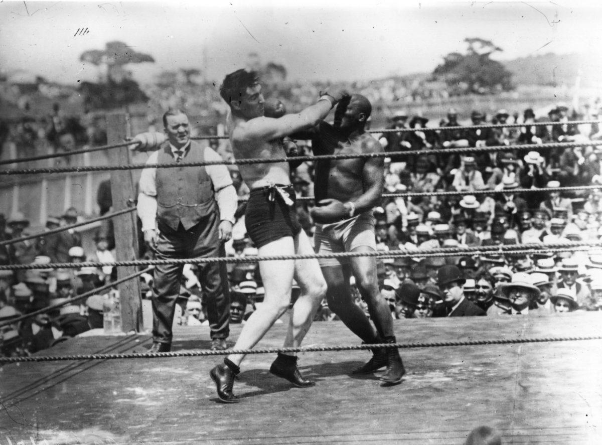 Jack Johnson, right, of the USA, world heavyweight titleholder since 1908, in action against Jess Willard of the USA at Havana, Cuba in 1915. Willard took the title with a knock-out in the 26th round and held onto it until 1919. (Topical Press Agency/Getty Images)