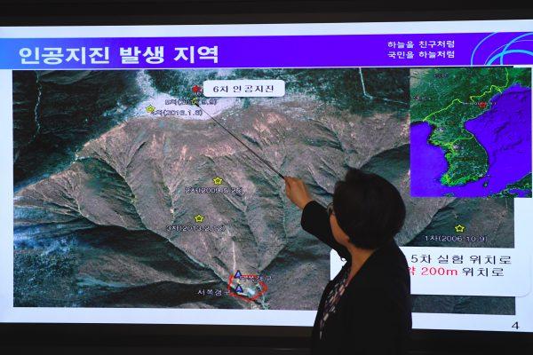Lee Mi-Seon, a director of the National Earthquake and Volcano Center, shows a map of a North Korean location, at the Korea Meteorological Administration in Seoul, South Korea, on September 3, 2017. (Jung Yeon-Je/AFP/Getty Images)
