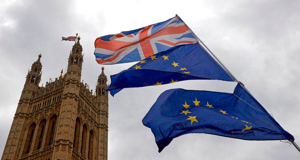 Union and European Union flags are flown in unison during an anti-Brexit demonstration outside the Houses of Parliament in London, UK, on June 20, 2018. (Niklas Halle'n/AFP/Getty Images)