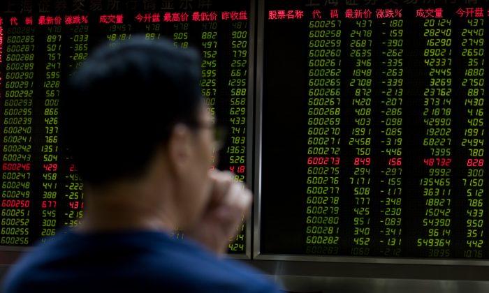 Trade War Produces Divergent Reaction from US, Chinese Markets