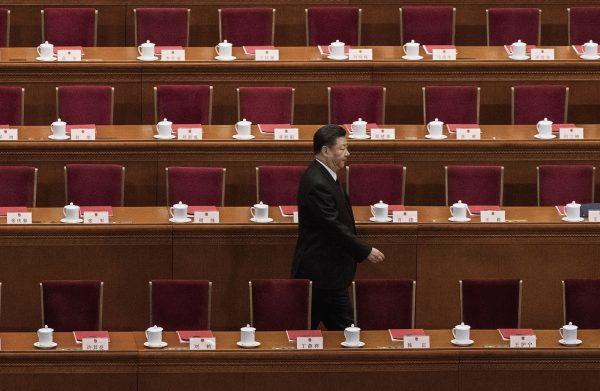 Chinese leader Xi Jinping arrives at the closing session of China's rubber-stamp legislature, the National People's Congress, at the Great Hall of the People in Beijing on March 20, 2018. (Kevin Frayer/Getty Images)
