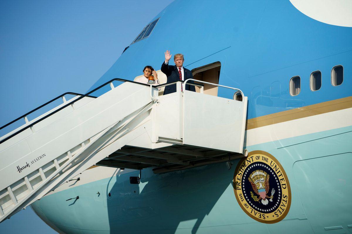 President Donald Trump and First Lady Melania Trump board Air Force One at London’s Stansted Airport en route to Scotland on July 13, 2018. (BRENDAN SMIALOWSKI/AFP/Getty Images)