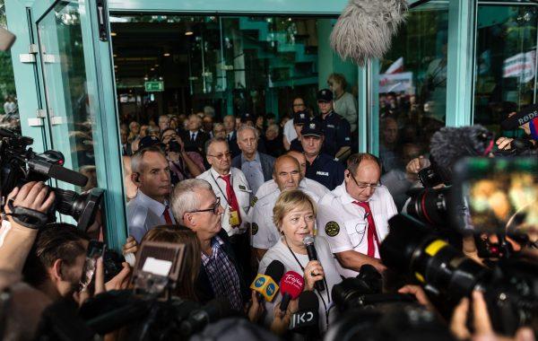 Polish Supreme Court Justice president Malgorzata Gersdorf is surrounded by media and supporters as she arrives for work at the Supreme Court building, on July 4, 2018, in Warsaw. (Wojtek Radwanski/AFP/Getty Images)