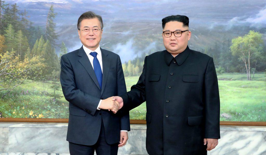 South Korean President Moon Jae-in shakes hands with North Korean leader Kim Jong Un during their summit at the truce village of Panmunjom, North Korea, in this handout picture provided by the Presidential Blue House on May 26, 2018. (The Presidential Blue House /Handout via Reuters)