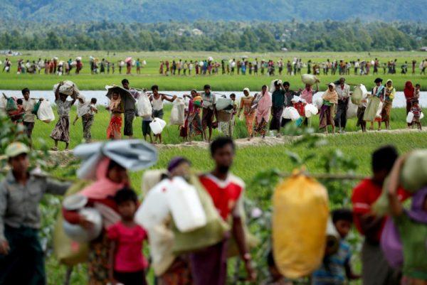 Rohingya refugees from Burma, after receiving permission from the Bangladeshi army, continue on to refugee camps, in Palang Khali, near Cox's Bazar, Bangladesh, Oct. 19, 2017. (Jorge Silva/Reuters/File Photo)
