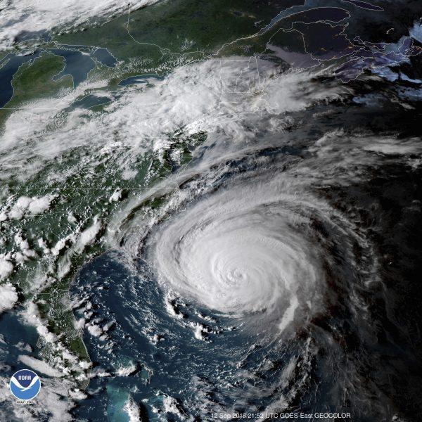 This enhanced satellite image made available by NOAA shows Hurricane Florence off the eastern coast of the United States on Sept. 12, 2018. (NOAA via AP)