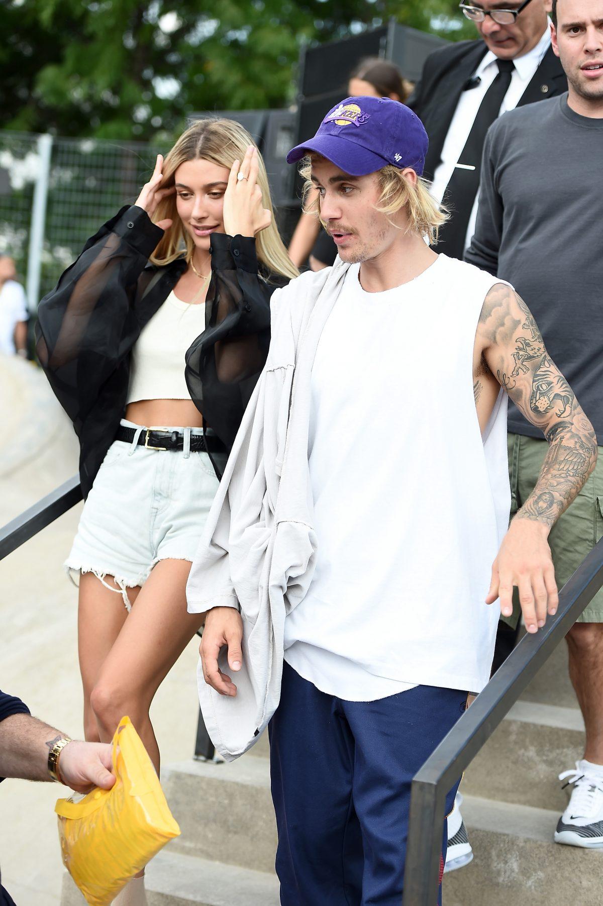 Hailey Baldwin (L) and Justin Bieber attend the John Elliott front row during New York Fashion Week: The Shows in New York City on Sept. 6, 2018. (Theo Wargo/Getty Images for NYFW: The Shows)