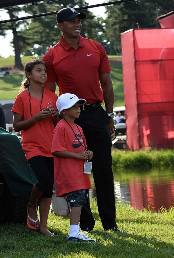 File photo: Tiger Woods with his children Sam (L) and Charlie after the Quicken Loans National at Congressional Country Club in Bethesda, Md., on June 26, 2016. (Andrew Caballero-Reynolds/AFP/Getty Images)