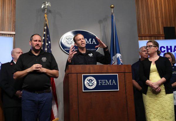 Federal Emergency Management Agency (FEMA) Administrator Brock Long (C) speaks during a briefing on Hurricane Michael at FEMA headquarters in Washington, DC., on Oct. 12, 2018. (Justin Sullivan/Getty Images)