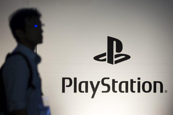 An attendee walks past the PlayStation logo during the Tokyo Game Show on Sept. 20, 2018. (Tomohiro Ohsumi/Getty Images)
