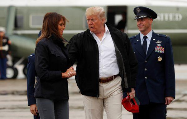 U.S. President Donald Trump and First Lady Melania Trump board Air Force One as they depart Joint Base Andrews in Maryland, on their way to visit areas affected by Hurricane Michael in Florida and Georgia on Oct. 15, 2018. (Kevin Lamarque/Reuters)