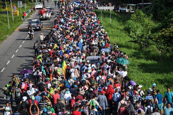 Honduran migrants take part in a caravan heading to the United States, on the road linking Ciudad Hidalgo and Tapachula in Chiapas state, Mexico, on Oct. 21, 2018. (Pedro Pardo/AFP/Getty Images)