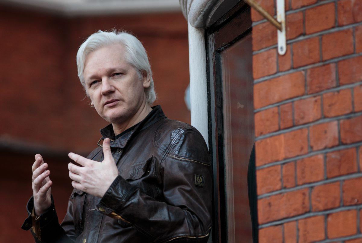 Julian Assange speaks to the media from the balcony of the Embassy Of Ecuador in London on May 19, 2017. (Jack Taylor/Getty Images)