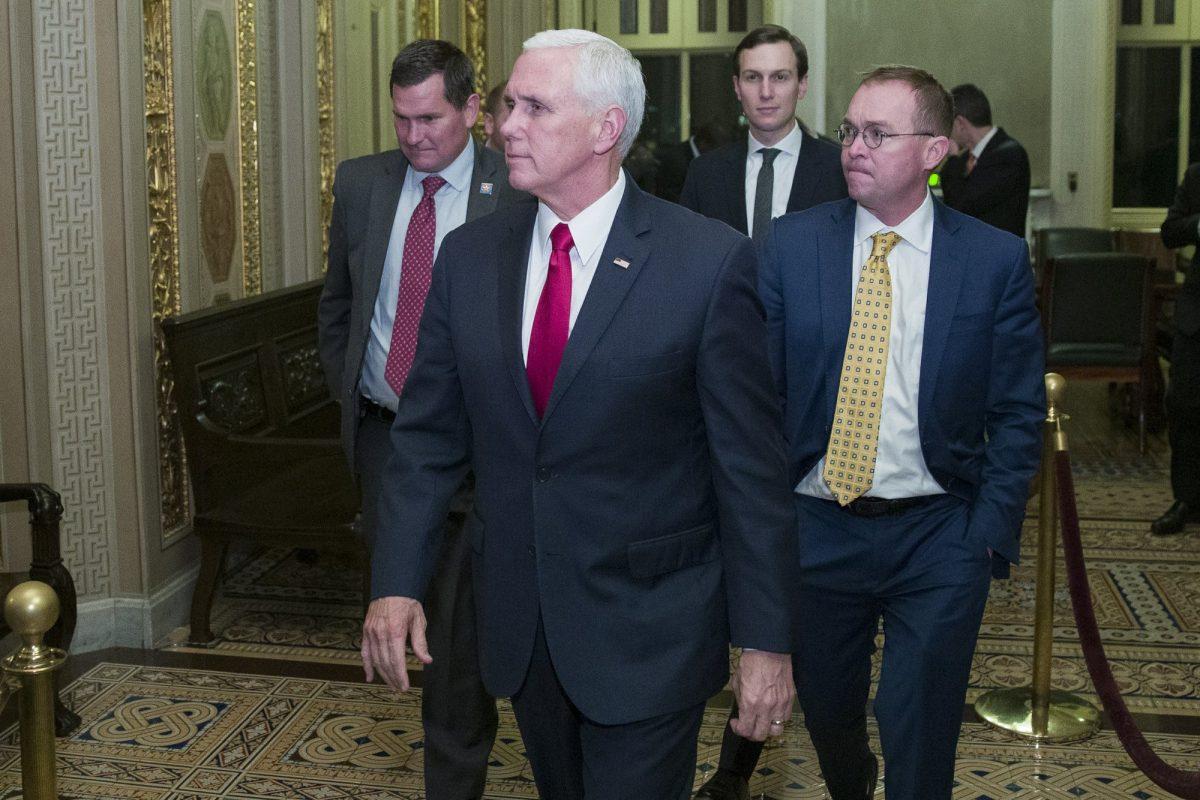 Vice President Mike Pence (second from L) with White House senior adviser Jared Kushner, and incoming White House Chief of Staff Mick Mulvaney leave for the night on Capitol Hill in Washington, on Dec. 21, 2018. (Alex Brandon/AP Photo)