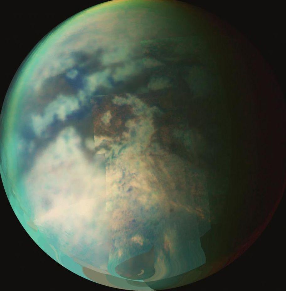 New research provides evidence of rainfall on the north pole of Titan, the largest of Saturn’s moons, shown here. The rainfall would be the first indication of the start of a summer season in the moon’s northern hemisphere, according to the researchers. (NASA/JPL/University of Arizona)
