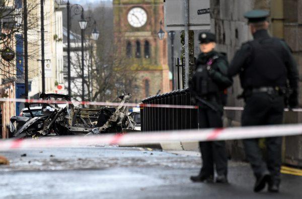 Police officers guard the scene of a suspected car bomb in Londonderry, Northern Ireland, on Jan. 20, 2019. (Clodagh Kilcoyne/Reuters)