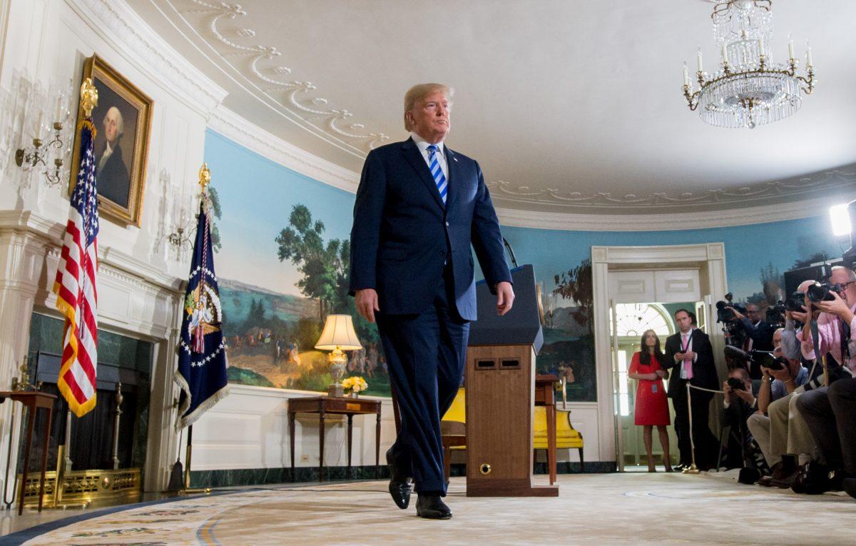 Trump leaves after announcing his decision about ending the nuclear deal with Iran during a speech from the Diplomatic Reception Room at the White House on May 8, 2018. (SAUL LOEB/AFP/Getty Images)