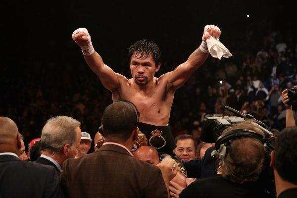 Manny Pacquiao celebrates after defeating Adrien Broner by unanimous decision during the WBA welterweight championship at MGM Grand Garden Arena in Las Vegas on Jan. 19, 2019. (Christian Petersen/Getty Images)