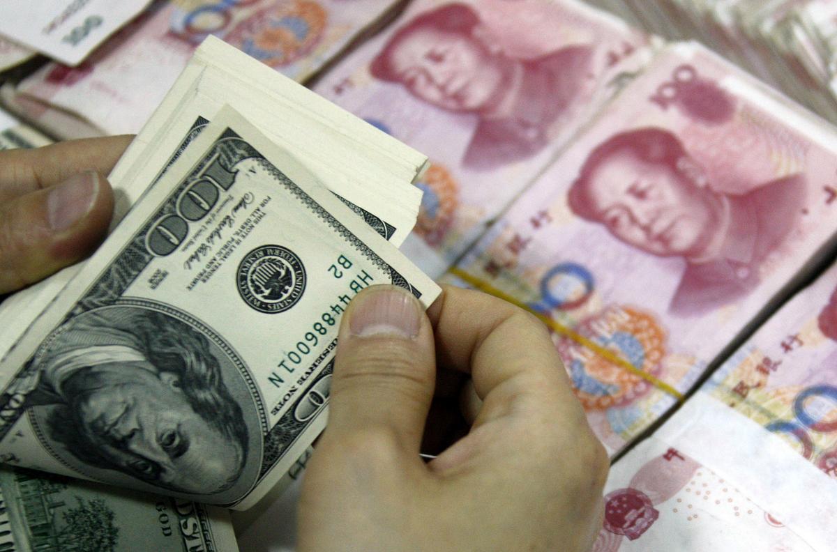 A Look at Tariff and Currency Through the Lens of US-China Trade War