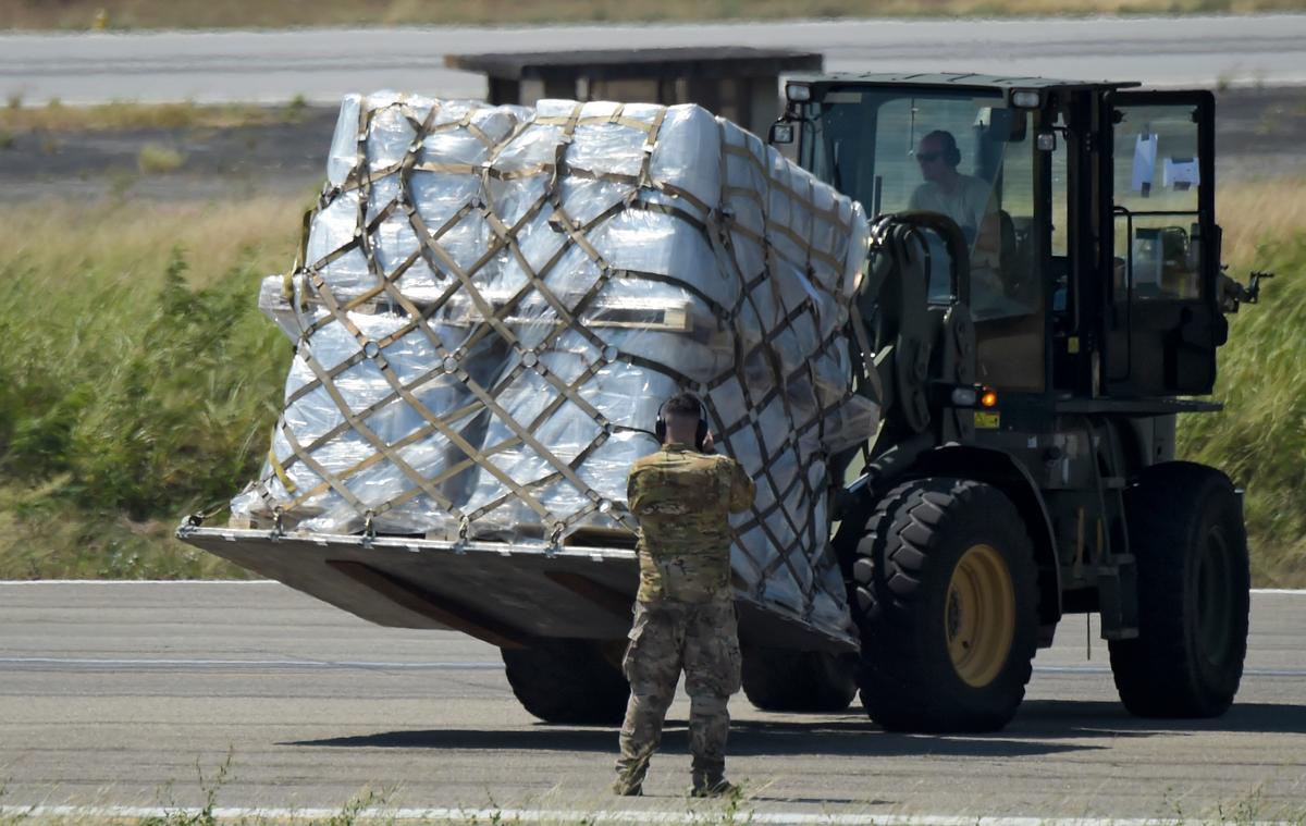 A truck is loaded with humanitarian aid for Venezuela after U.S. Air Force C-17 aircrafts landed at Camilo Daza International Airport in Cucuta, Colombia, on the border with Venezuela on Feb. 16, 2019.(Raul Arboleda/AFP/Getty Images)