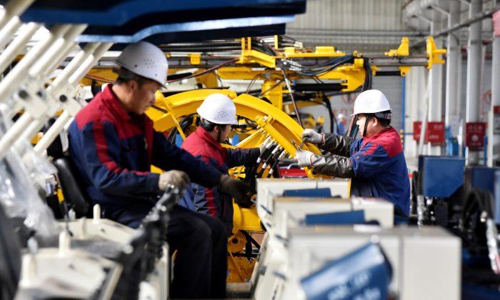 China Industrial Output Growth Falls to 17-Year Low