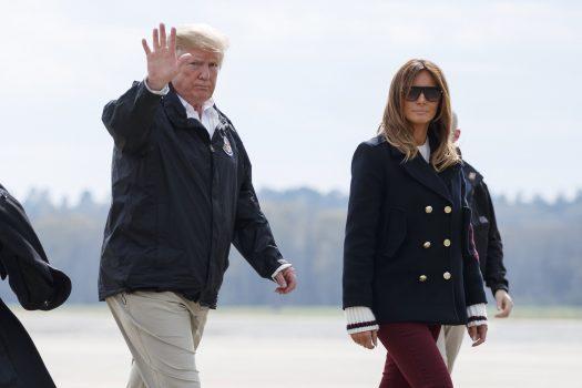 President Donald Trump and first lady Melania Trump walk from Marine One to board Air Force One at Lawson Army Airfield, Fort Benning, Ga., en route Palm Beach International Airport in West Palm Beach, Fla., after visiting Lee County, Ala., where tornados killed 23 people, on March 8, 2019. (Carolyn Kaster/AP Photo)