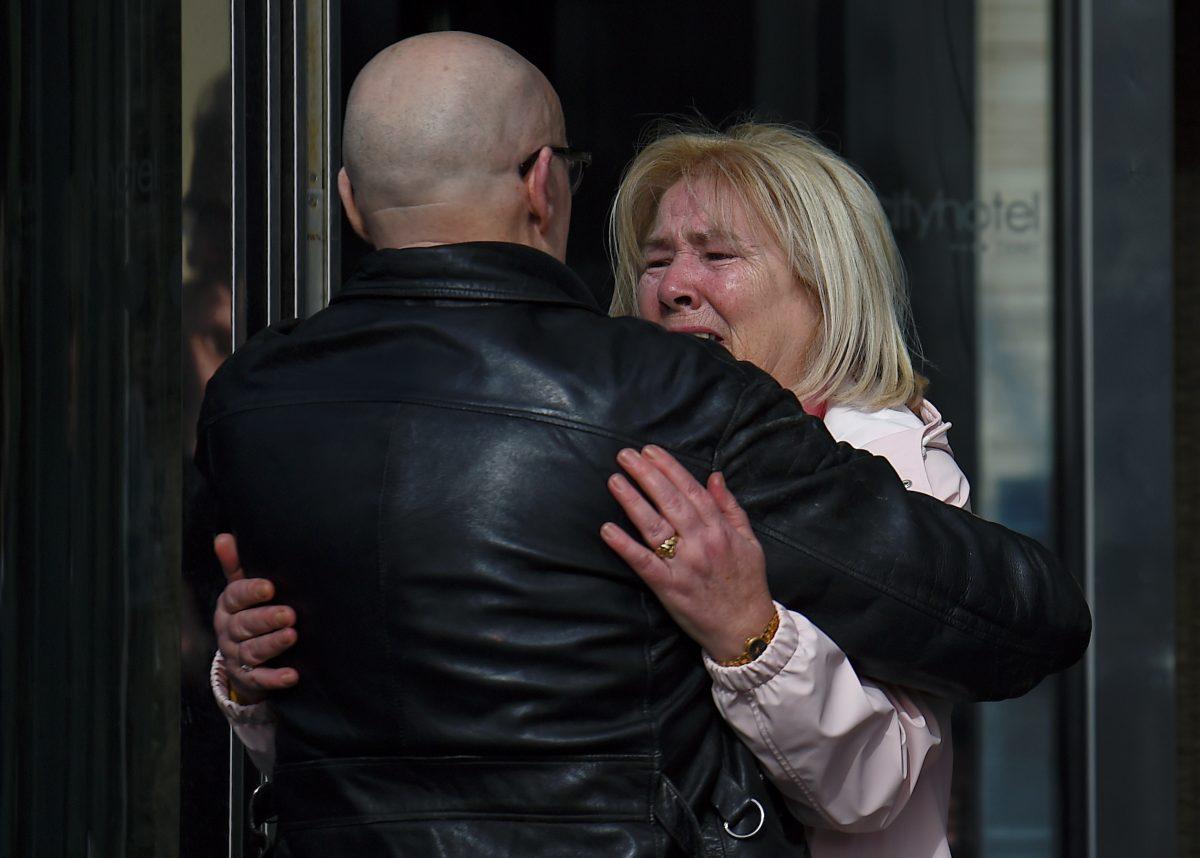 Linda Nash and campaigner Eamonn McCann react after the announcement of the decision whether to charge soldiers involved in Bloody Sunday, in Londonderry, Northern Ireland, on March 14, 2019. (Clodagh Kilcoyne/Reuters)