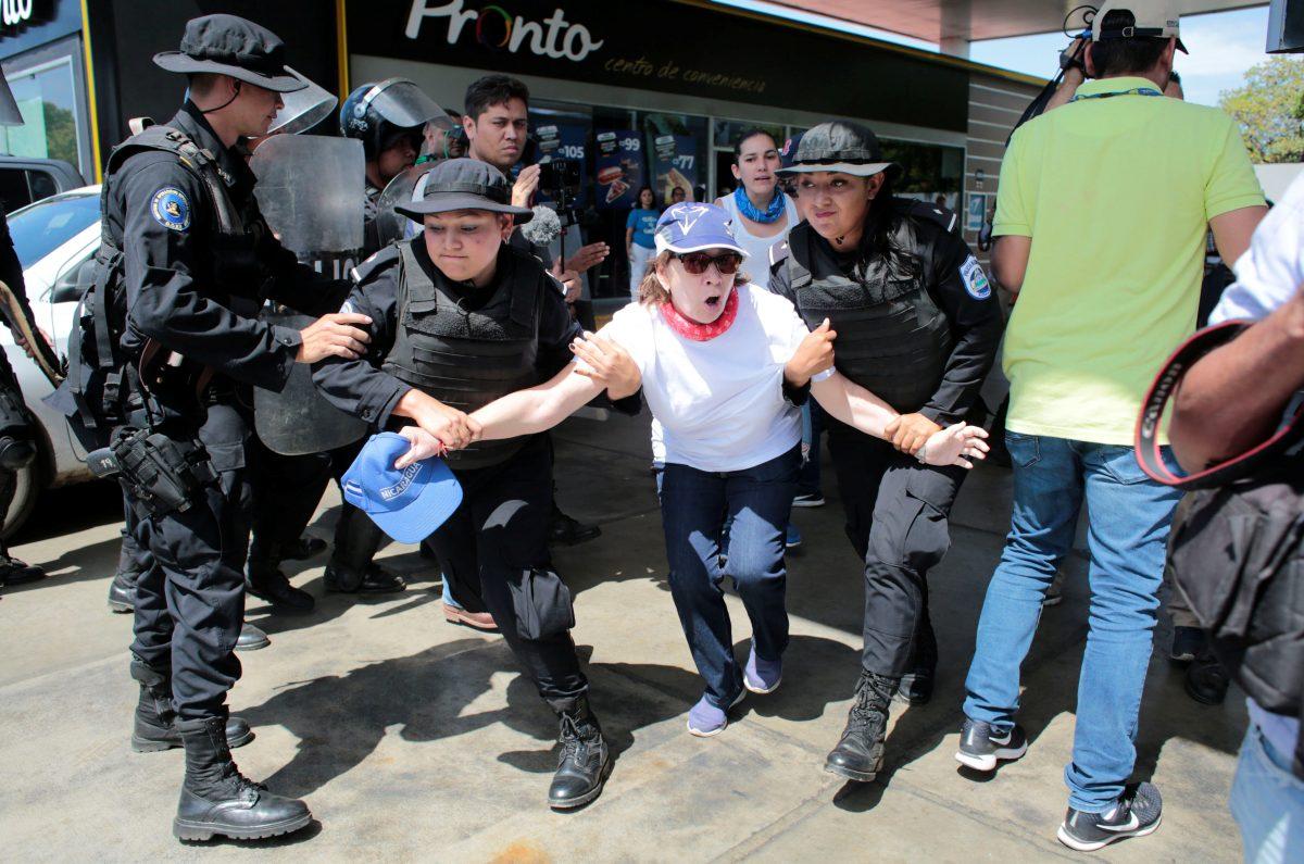 Riot police detain a demonstrator during a protest against the government of Nicaragua's President Daniel Ortega in Managua, Nicaragua, on March 16, 2019. (Reuters/Oswaldo Rivas)