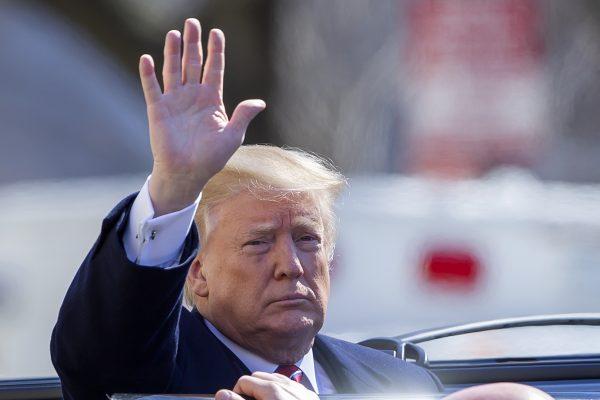 President Donald Trump gestures as he departs after attending services at St. John's Episcopal Church in Washington, on March 17, 2019. (Eric Lesser/Getty Images)
