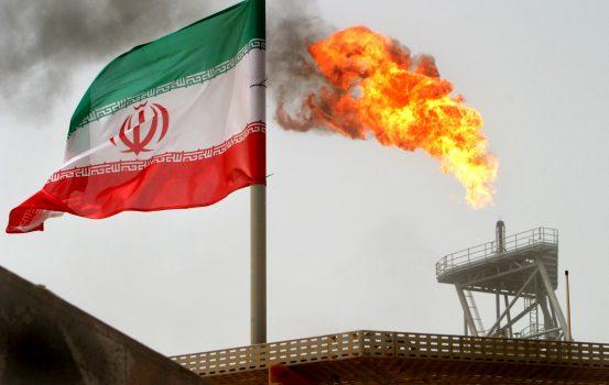 A gas flare on an oil production platform in the Soroush oil fields in Iran, on July 25, 2005. (Reuters/Raheb Homavandi)