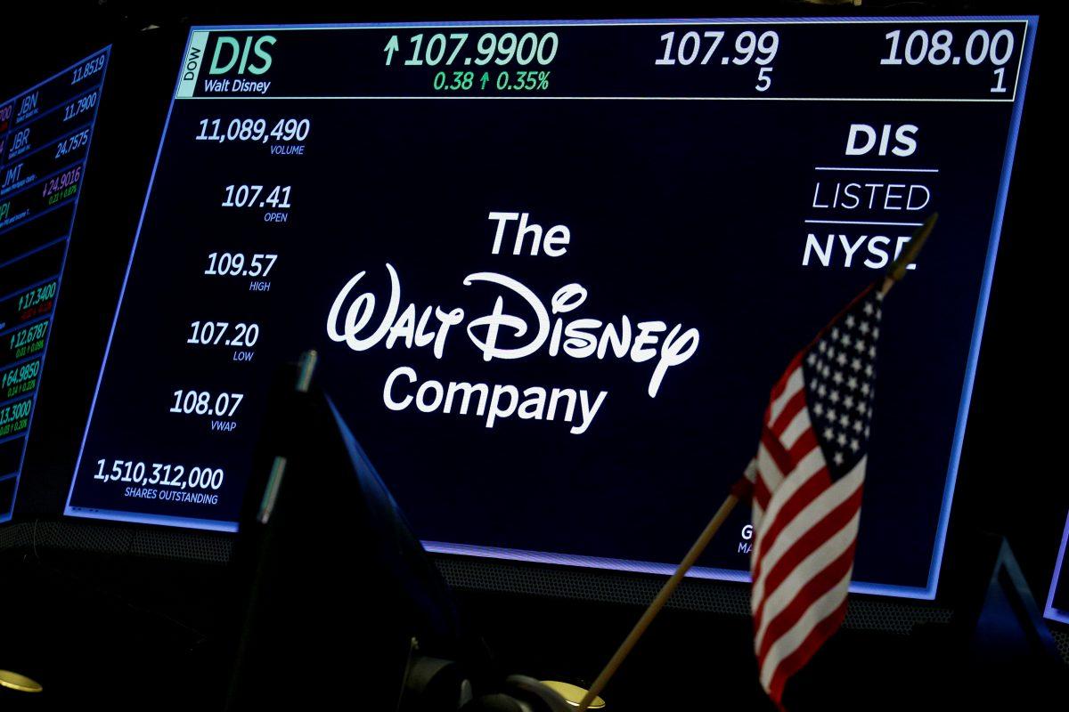 A screen shows the logo and a ticker symbol for The Walt Disney Company at the New York Stock Exchange on Dec. 14, 2017. (Brendan McDermid/Reuters)