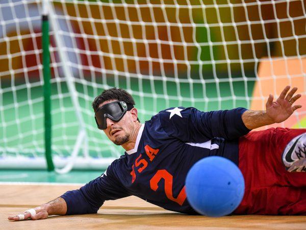 Tyler Merren defends against a shot during a game of Goalball. (Loren Worthington)