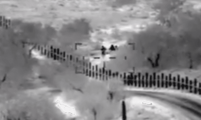 Video Shows Armed Men Escorting Mother and Son Across US Border