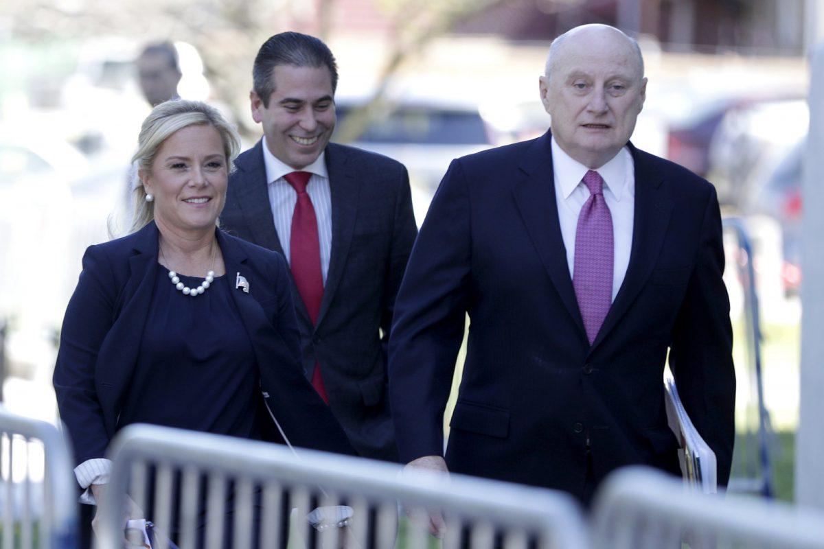 Bridget Anne Kelly, left, the former Deputy Chief of Staff for former New Jersey Gov. Chris Christie, walks with her lawyer Michael Critchley, right, and an associate while arriving at the Martin Luther King, Jr., Federal Courthouse for a re-sentencing hearing in Newark, N.J., on April 24, 2019. (Julio Cortez/AP Photo)