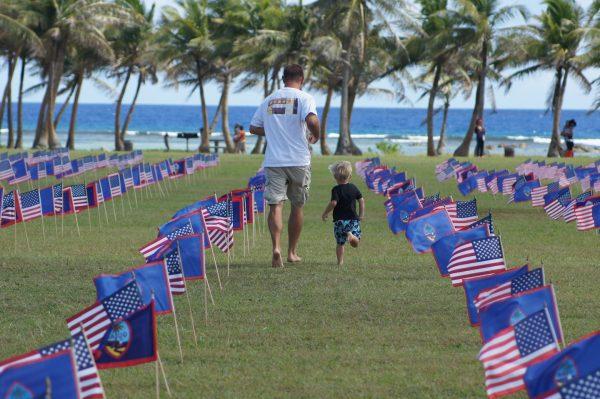 Solemn remembrance and national pride on display on Liberation Day. (Courtesy of Guam Visitors Bureau)