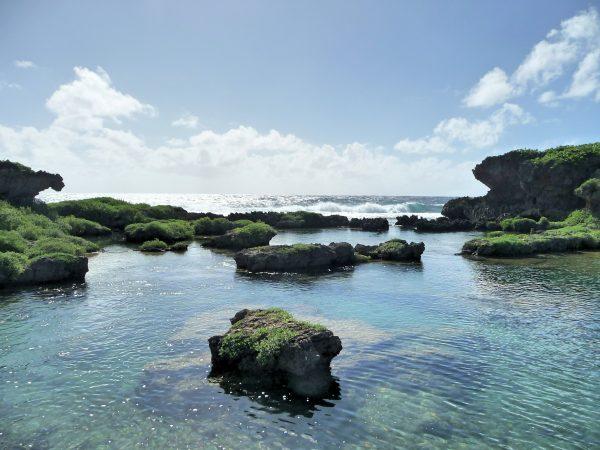 Inarajan Pools, a natural system of oceanfront swimming holes. (Courtesy of Guam Visitors Bureau)