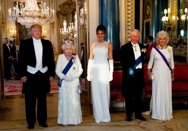 Britain's Queen Elizabeth II (2L), US President Donald Trump (L), US First Lady Melania Trump (C), Britain's Prince Charles, Prince of Wales (2R) and Britain's Camilla, Duchess of Cornwall pose for a photograph ahead of a State Banquet in the ballroom at Buckingham Palace in central London on June 3, 2019, on the first day of the US president and First Lady's three-day State Visit to the UK. - Britain rolled out the red carpet for US President Donald Trump on June 3 as he arrived in Britain for a state visit already overshadowed by his outspoken remarks on Brexit. (Doug Mills/AFP/Getty Images)