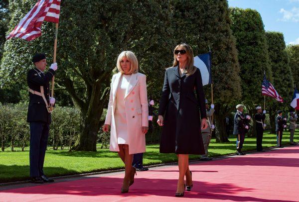 US First Lady Melania Trump (L) and Brigitte Macron (R) arrive to attend a French-US ceremony at the Normandy American Cemetery and Memorial in Colleville-sur-Mer, Normandy, northwestern France, on June 6, 2019, as part of D-Day commemorations marking the 75th anniversary of the World War II Allied landings in Normandy. (Ian Langsdon/AFP/Getty Images)