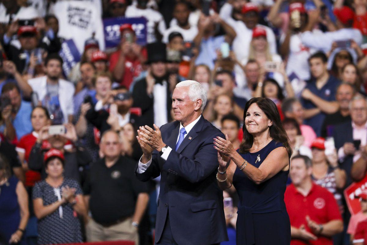 Vice President Mike Pence and Second Lady Karen Pence at President Donald Trump’s 2020 re-election event in Orlando, Fla., on June 18, 2019. (Charlotte Cuthbertson/The Epoch Times)