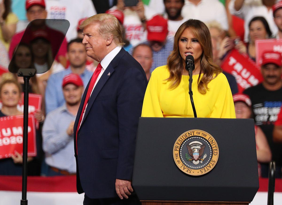 President Donald Trump and First Lady Melania Trump arrive on stage as President Trump prepares to announce his candidacy for a second presidential term at the Amway Center on June 18, 2019 in Orlando, Florida. President Trump is set to run against a wide open Democratic field of candidates. (Joe Raedle/Getty Images)