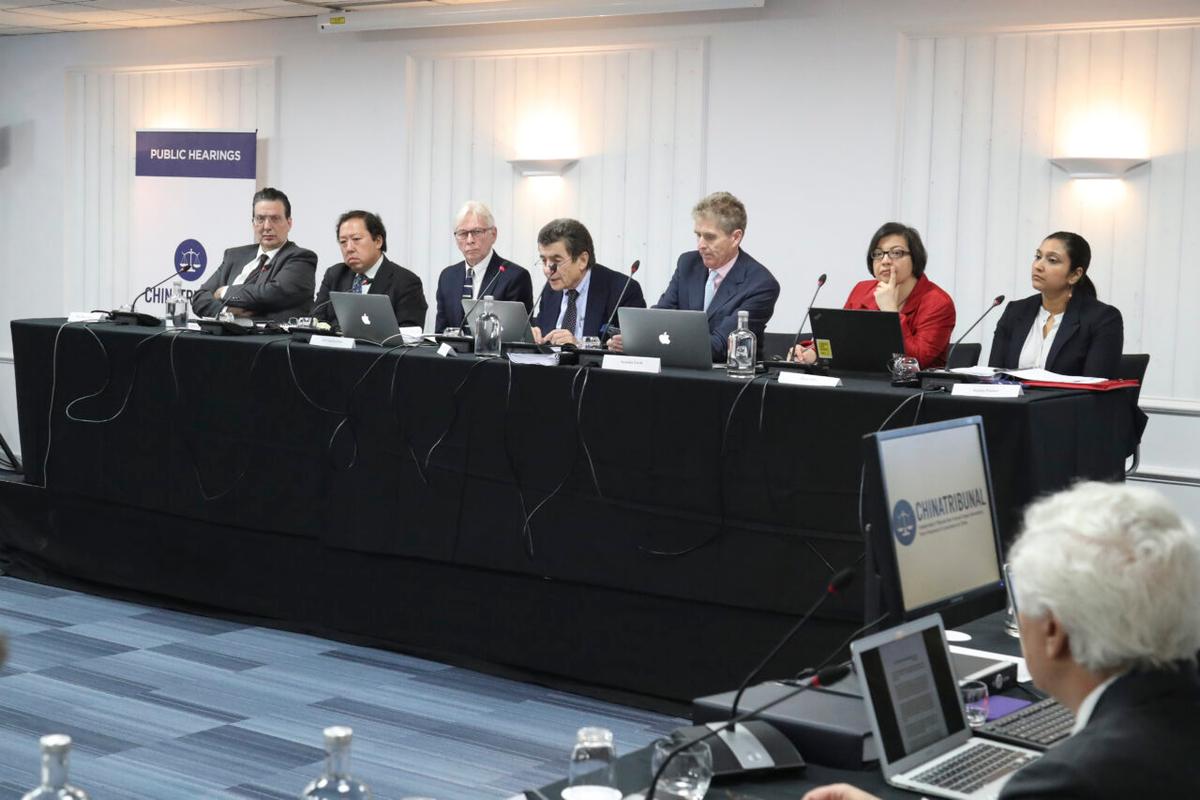 The China Tribunal panel (L–R) of U.S. history professor Arthur Waldron, Malaysian lawyer Andrew Khoo, professor of cardiothoracic surgery Martin Elliott, tribunal chair Sir Geoffrey Nice QC, businessman Nicholas Vetch, Iranian human rights lawyer Shadi Sadr, and U.S. lawyer Regina Paulose, in London, on Dec. 8, 2018. (Justin Palmer)